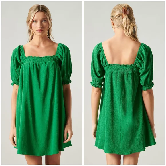 green emerald velvet dress Norma Kamali Women's Sleeveless Babydoll Dress in Kelly Green, L at Amazon  Women's Clothing store main image 1